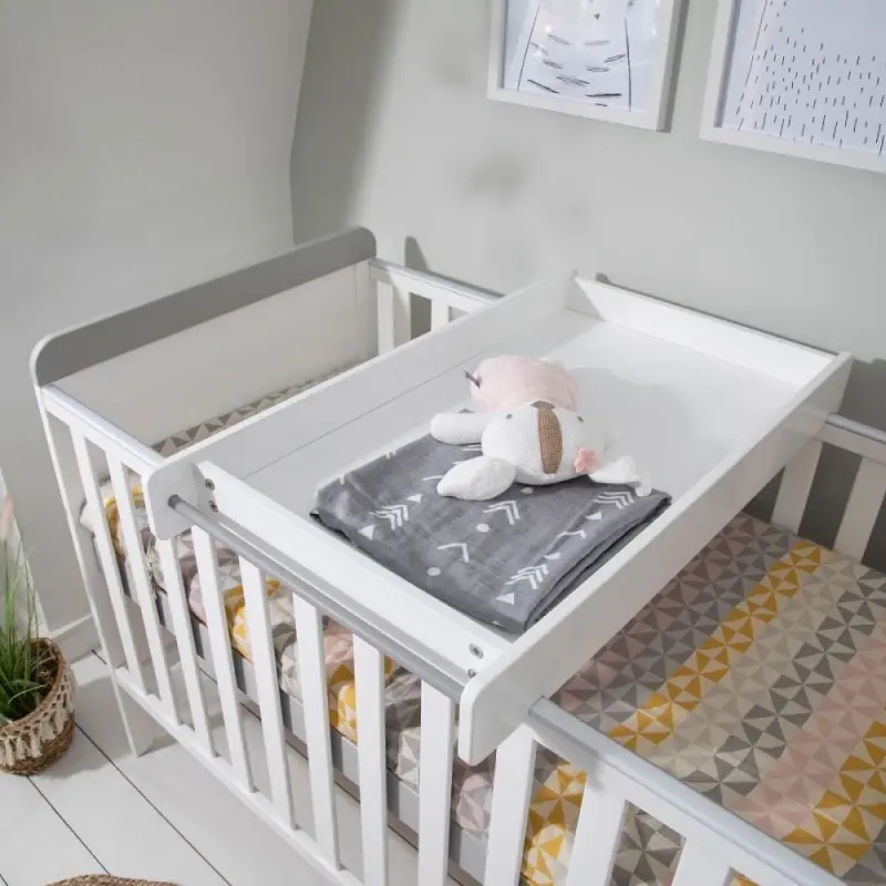 White cot outlet bed with changer