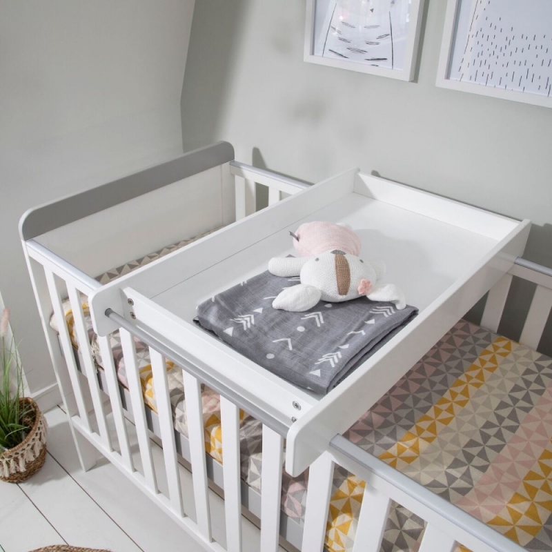 cot bed with changing top